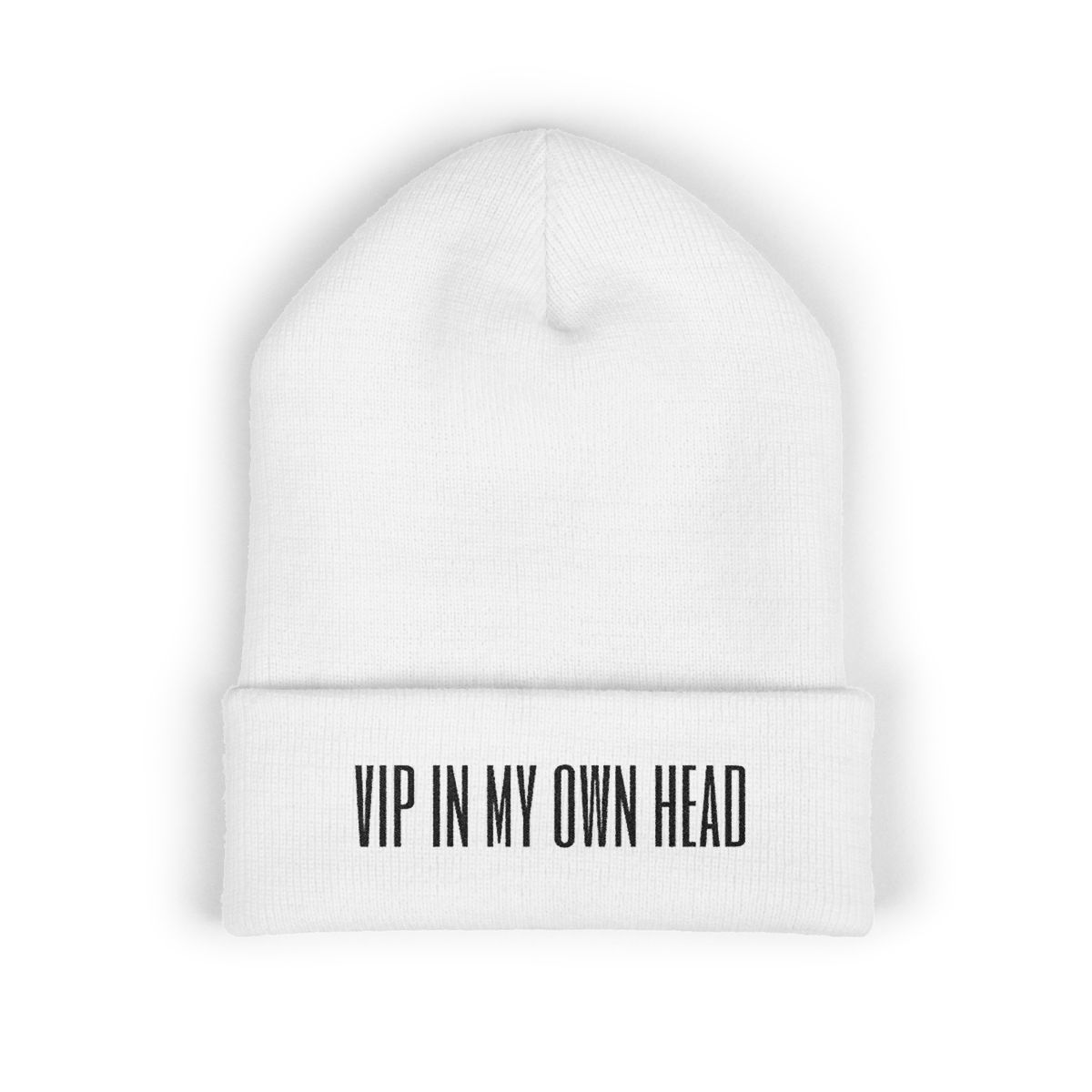 White cuffed beanie with “VIP in My Own Head” embroidered across the fold.